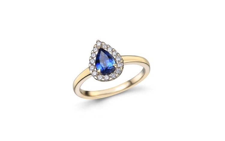 Geel gouden ring met blauwe saffier